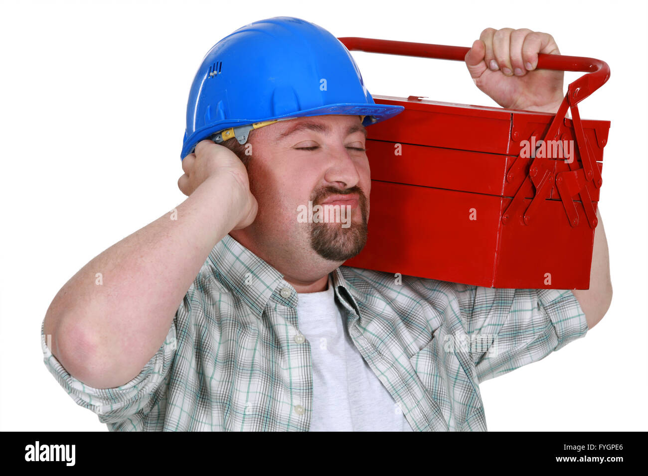 Construction worker listening to the sweet sounds of his toolbox Stock