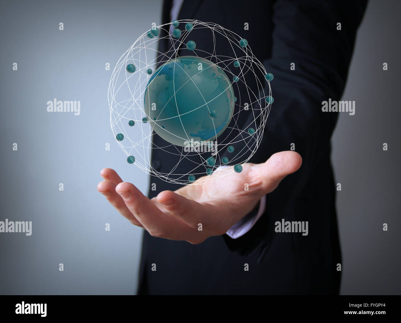 atomic structure over businessman hand Stock Photo