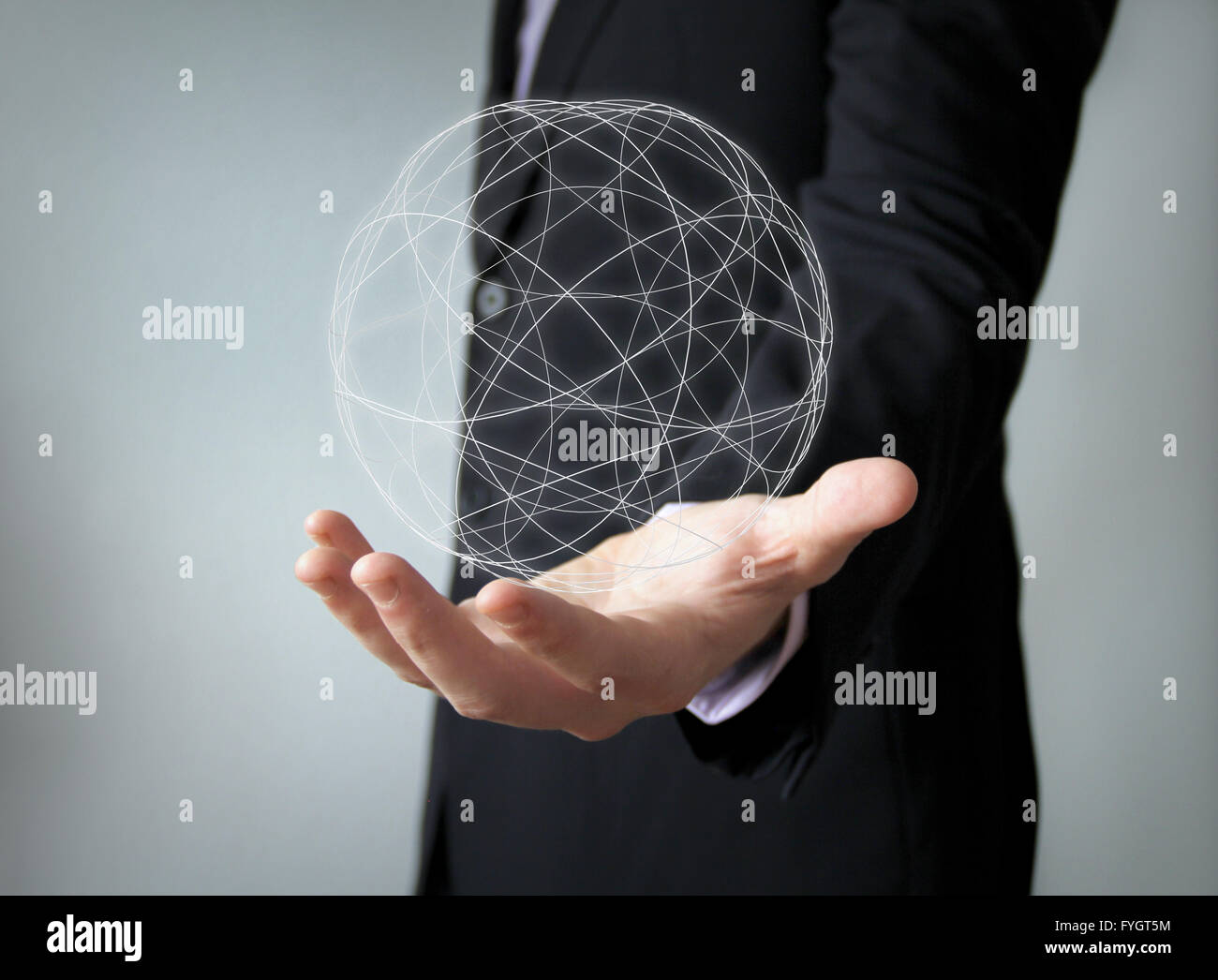 worldwide concept: spherical structure over businessman han Stock Photo