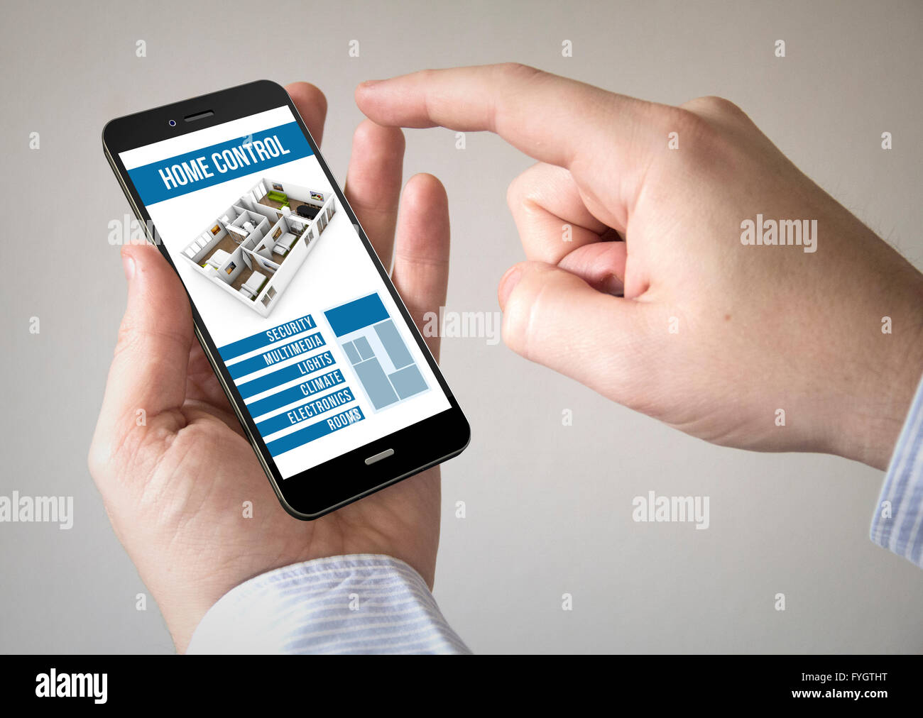 Close up of man using mobile smart phone with smart home control app on the screen Stock Photo