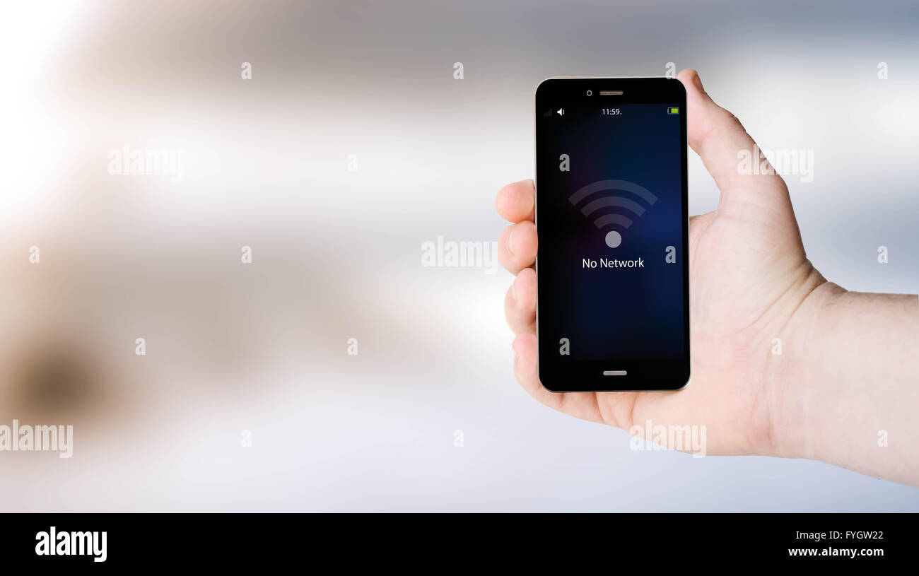 connectivity concept: no network sign on digital generated phone screen with sea background. All screen graphics are made up. Stock Photo