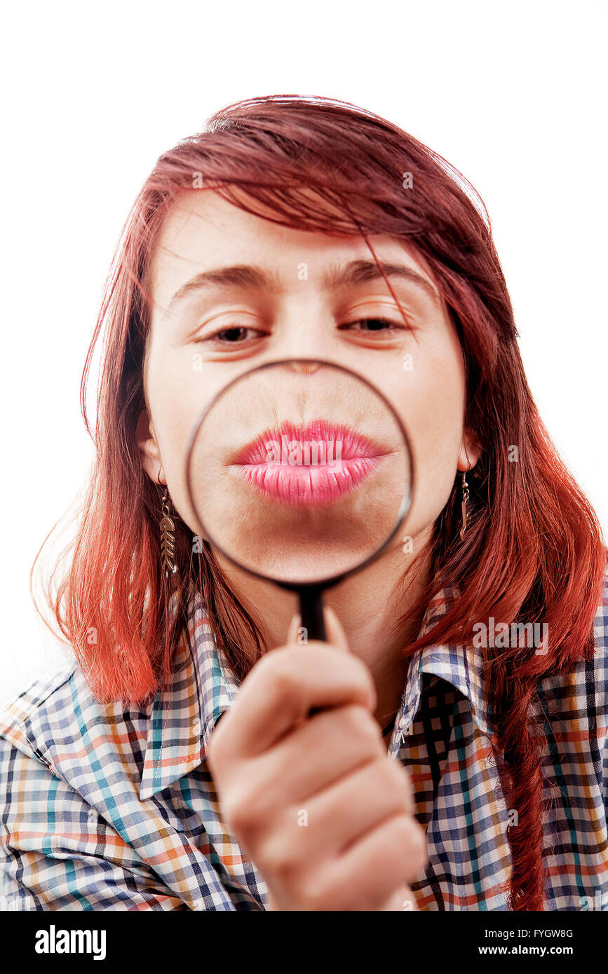 Funny Woman giving Kiss through Magnifying Glass Stock Photo - Alamy