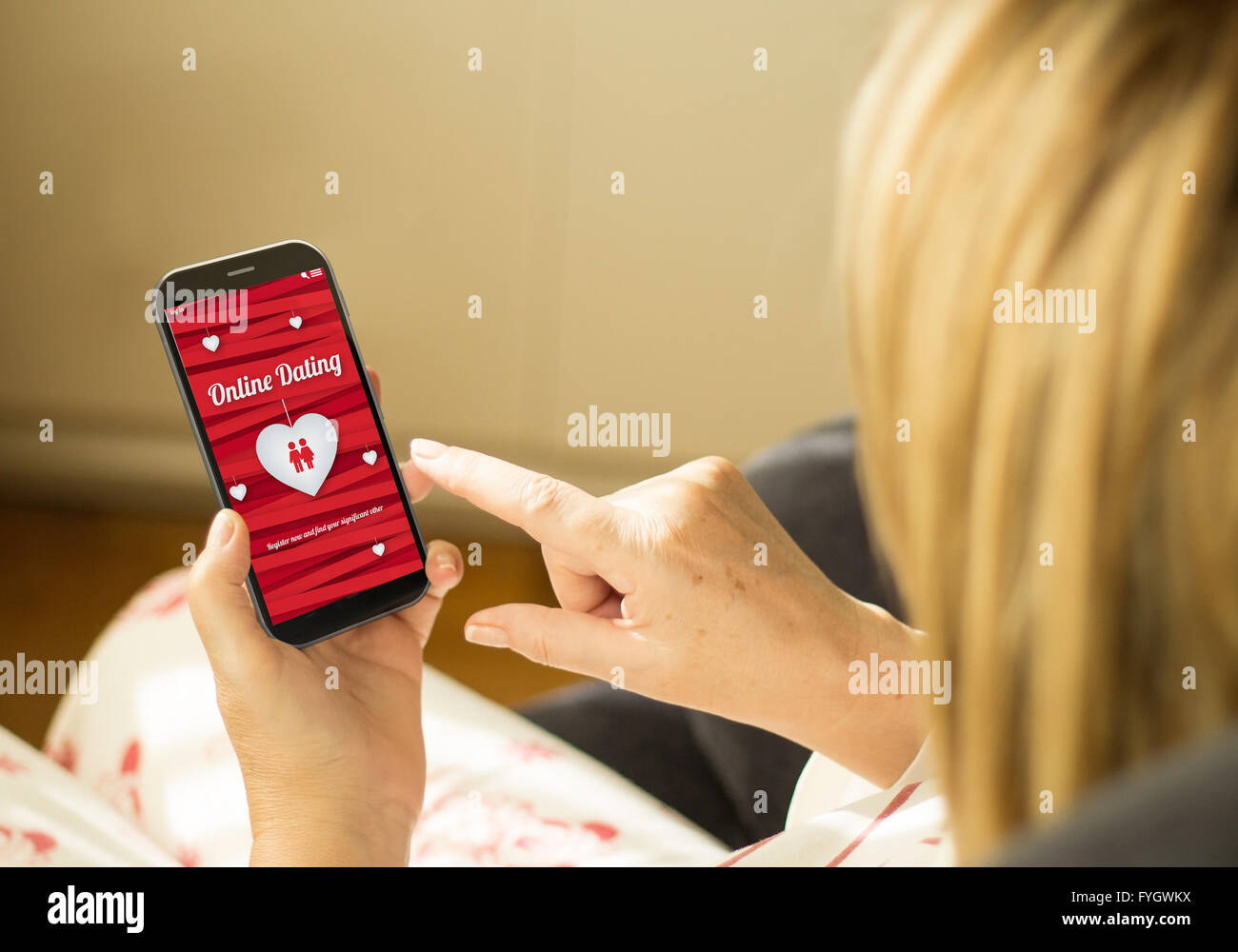 modern relationships concept: mature woman with 3d generated touchscreen smartphone with online dating on the screen. Screen gra Stock Photo