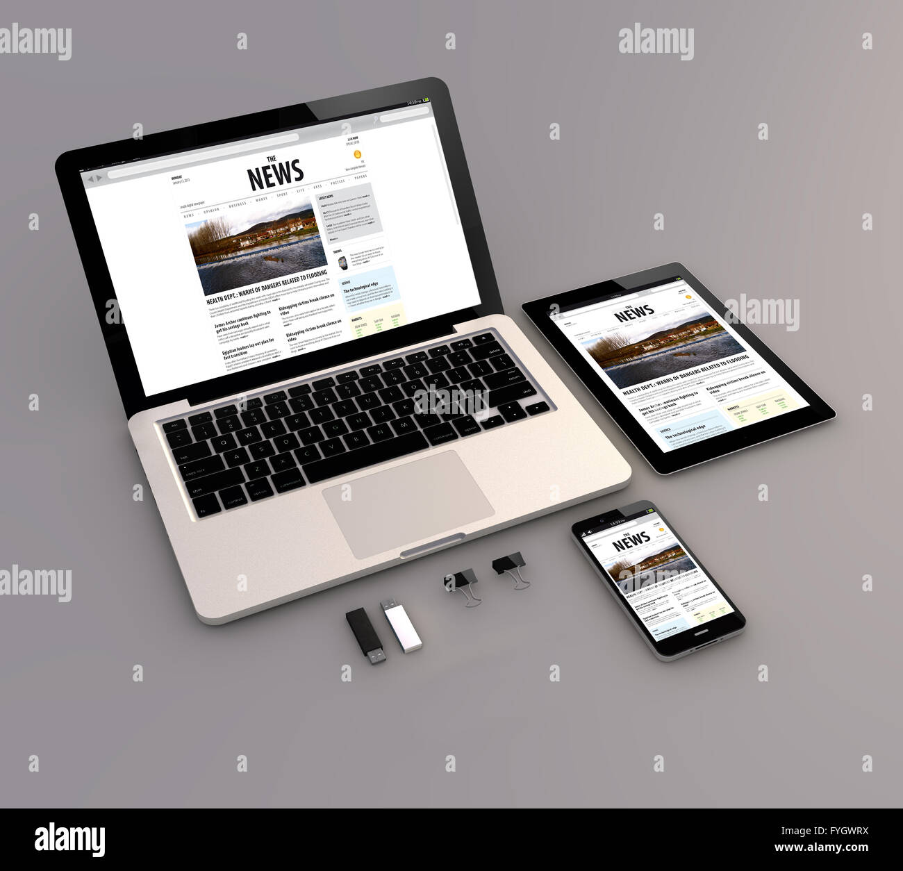 Responsive news site: Open laptop with digital tablet and smartphone. 3d Generated. All screen graphics are made up. Stock Photo