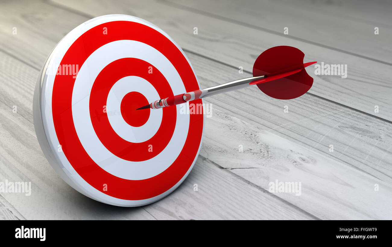 strategic business solutions, marketing or corporate strategy concept: digital generated dart in the center of a red target, mod Stock Photo