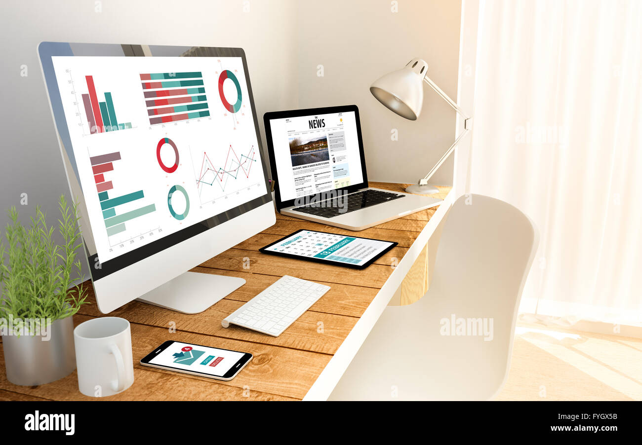 byod concept on an hardwood desk on devices mock up. Screen graphics are made up. Stock Photo