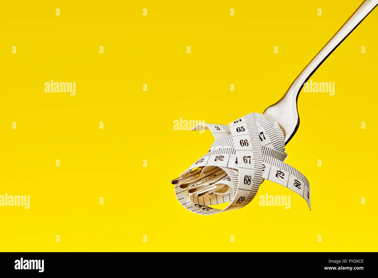 Fork with Tape Measure Dieting Concept Obesity Stock Photo