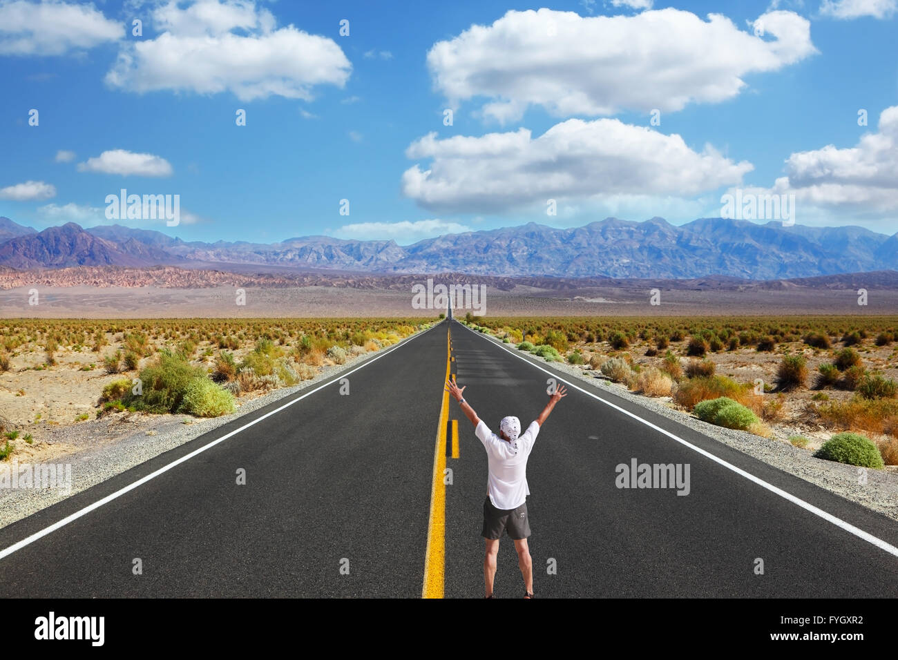 The enthusiastic tourist welcomes midday on great American road Stock Photo
