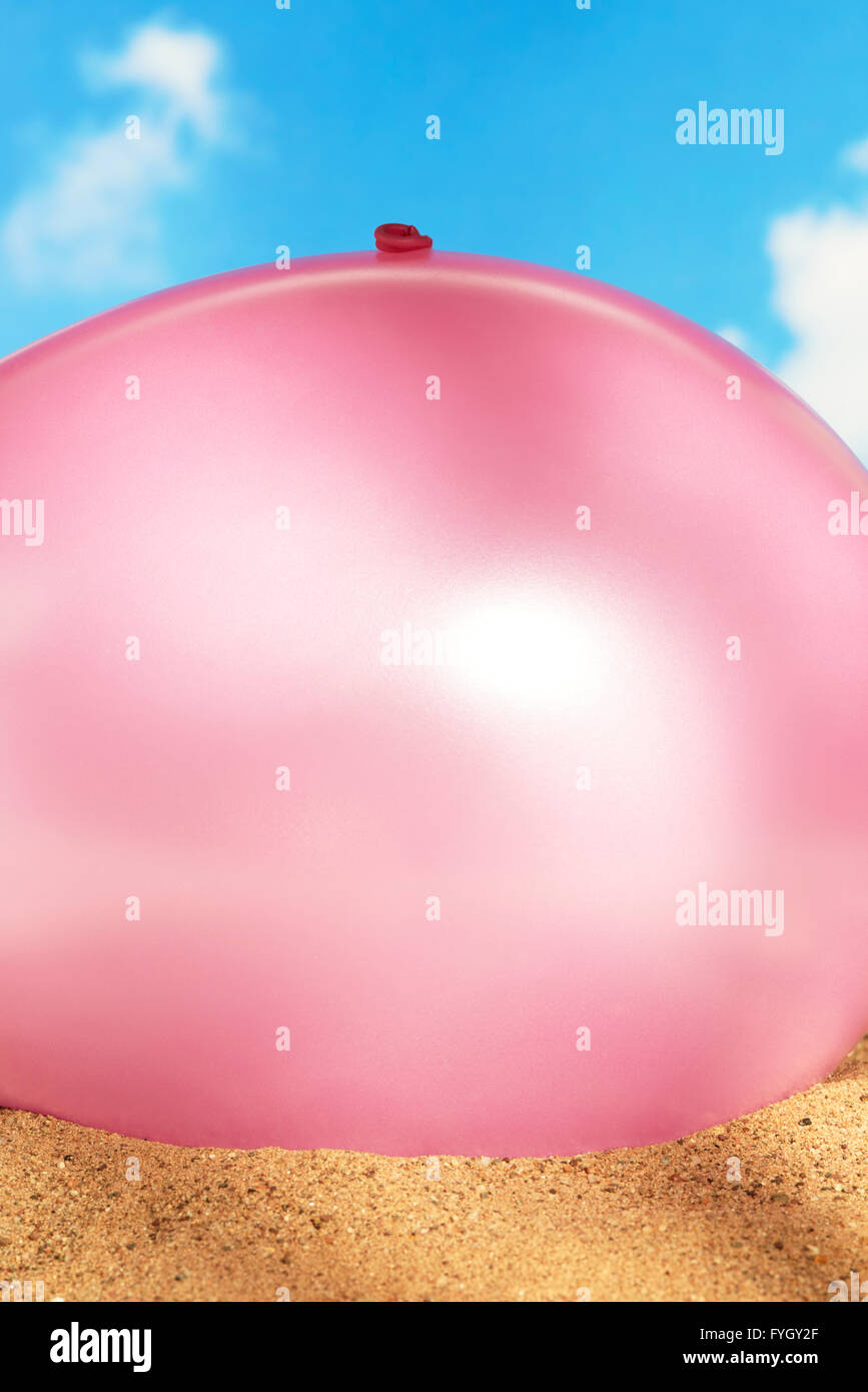 Ballooned Belly on Beach Obesity Stock Photo