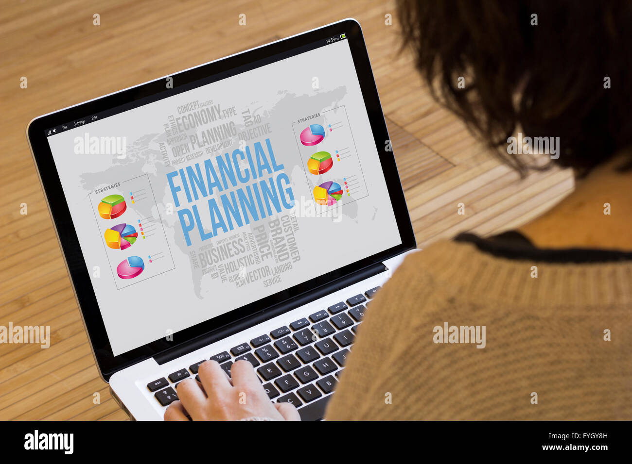 business and strategy concept: financial planning on a laptop screen. Screen graphics are made up. Stock Photo