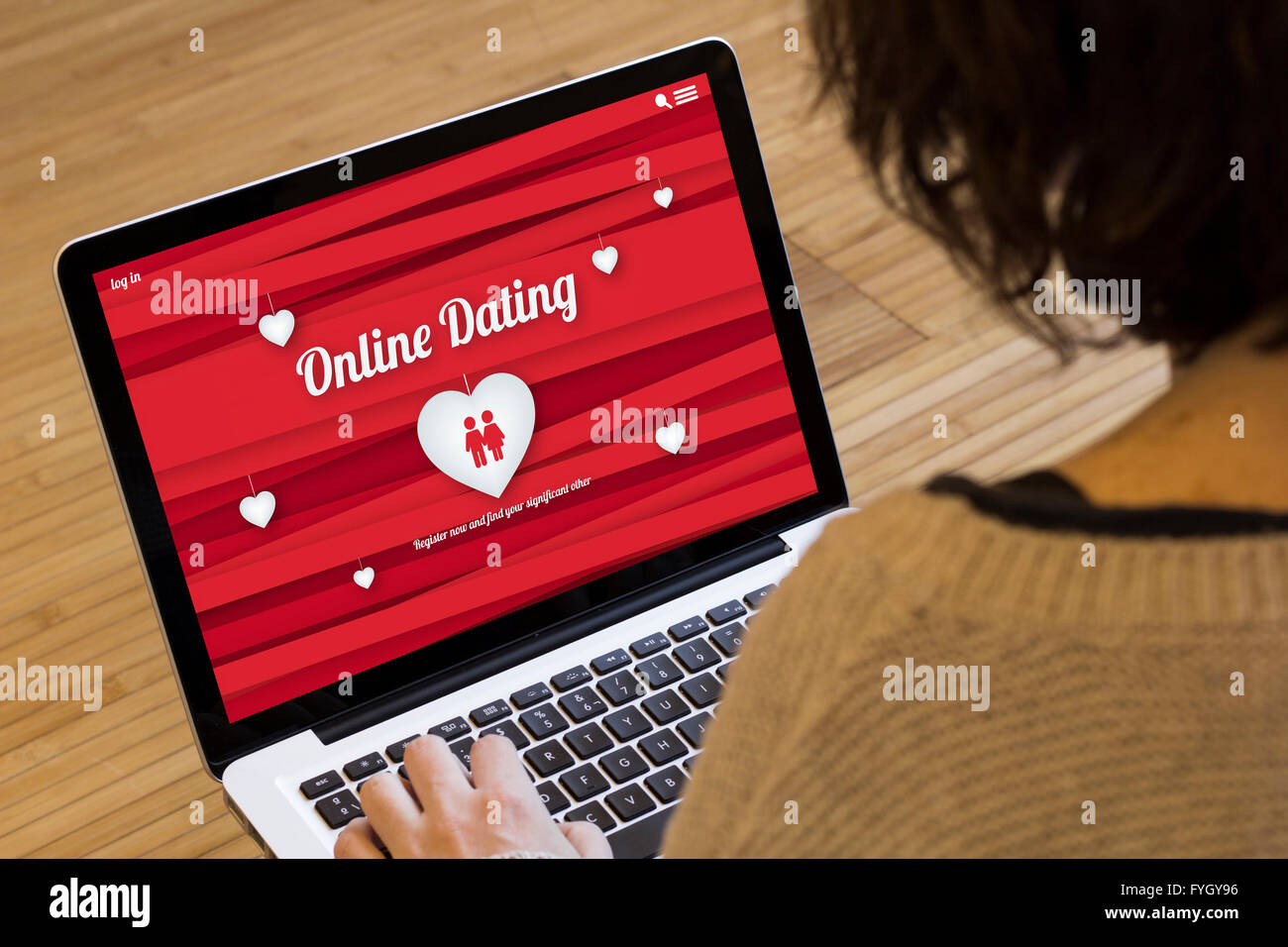 dating online concept: online dating website on a laptop screen. Screen graphics are made up. Stock Photo