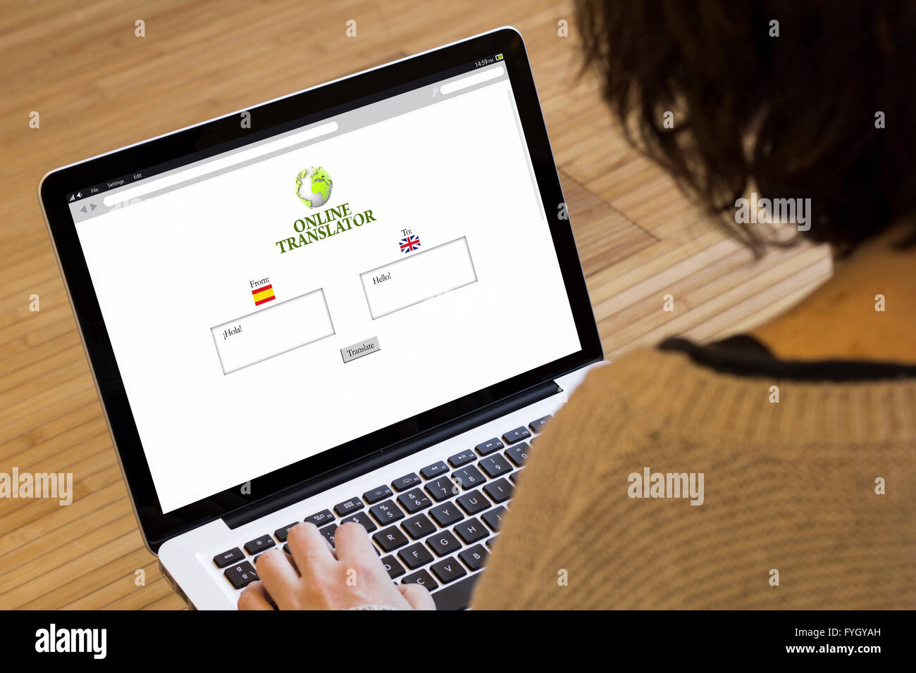 translation concept: online translator on a laptop screen. Screen graphics are made up. Stock Photo