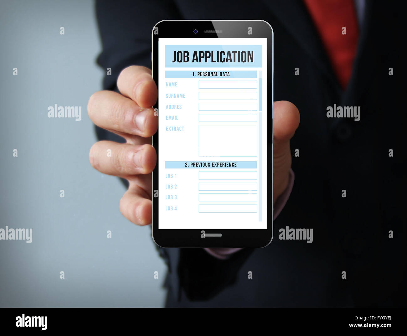 job search concept: businessman hand holding a touch phone with online job application on the screen Stock Photo