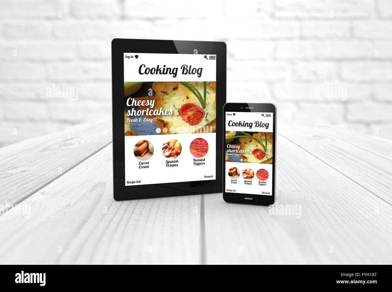 tablet pc computer and mobile smartphone with cooking blog on the screen. All screen graphics are made up. Stock Photo