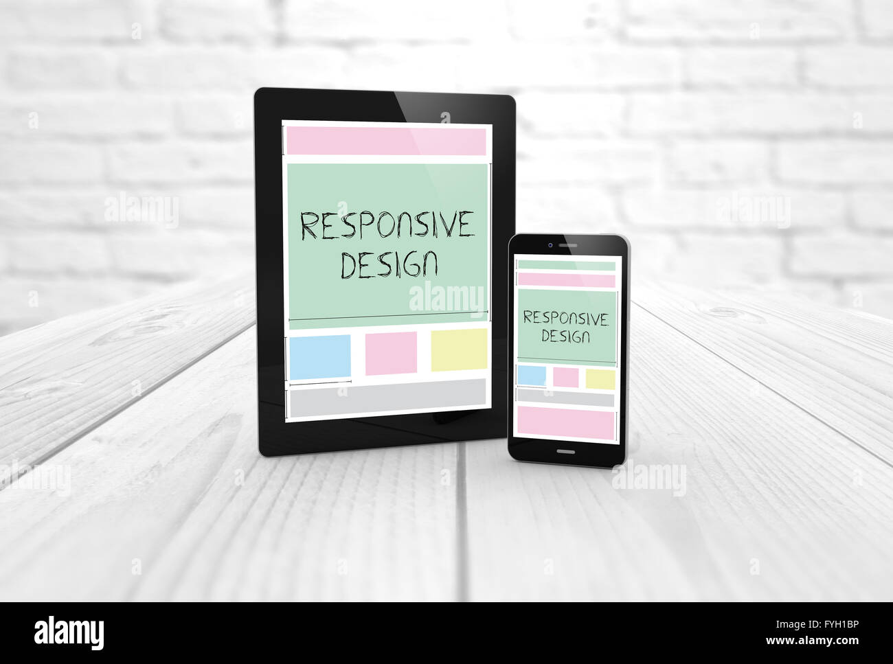 responsive design wireframe on a digital generated tablet display  and smartphone. All screen graphics are made up. Stock Photo