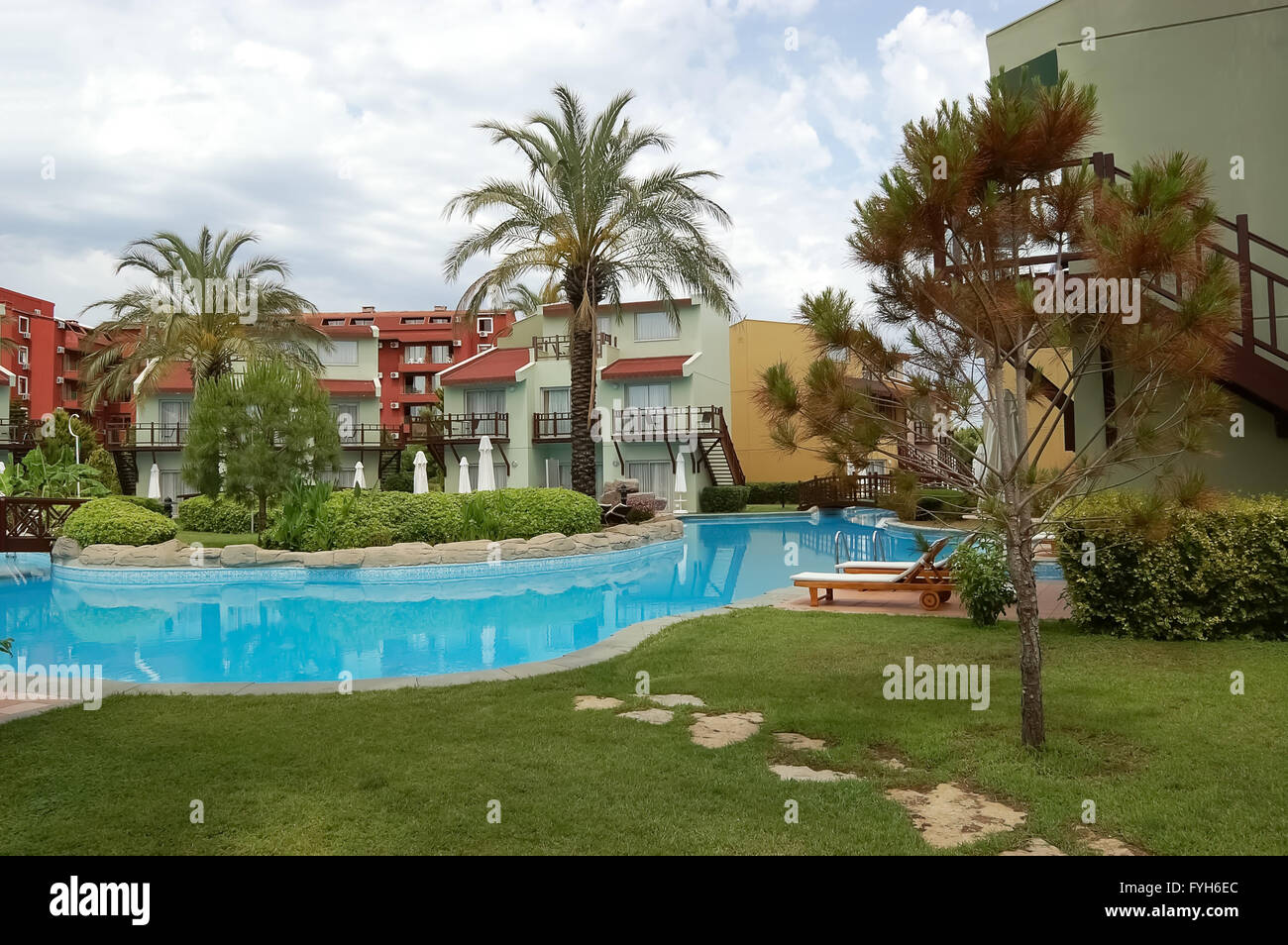 Side, ANTALYA, TURKEY - JUNE 02, 2015: View of trees around pool in hotel Silence Beach Resort, Turkey. Stock Photo