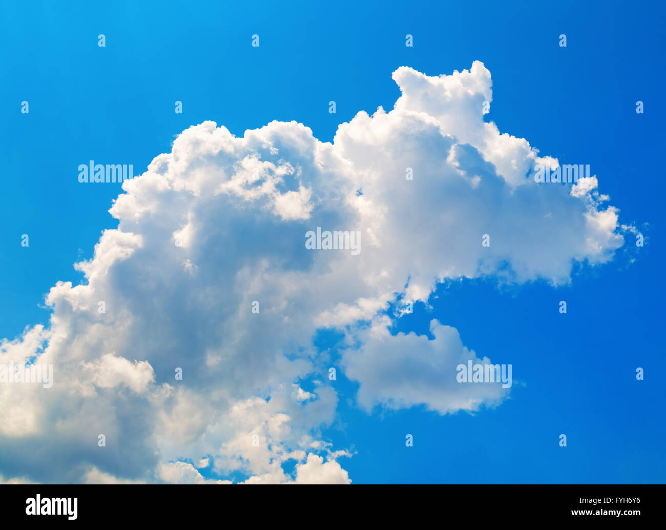 Bright blue sky with white cumulus cloud Stock Photo - Alamy