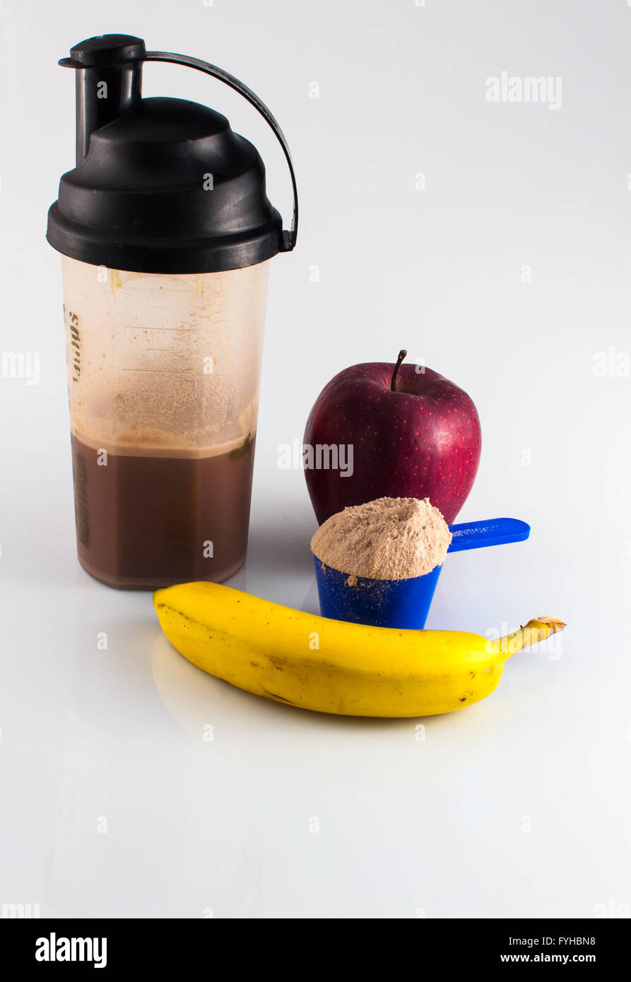 post workout meal with whey protein, shaker, banana and apple Stock Photo -  Alamy