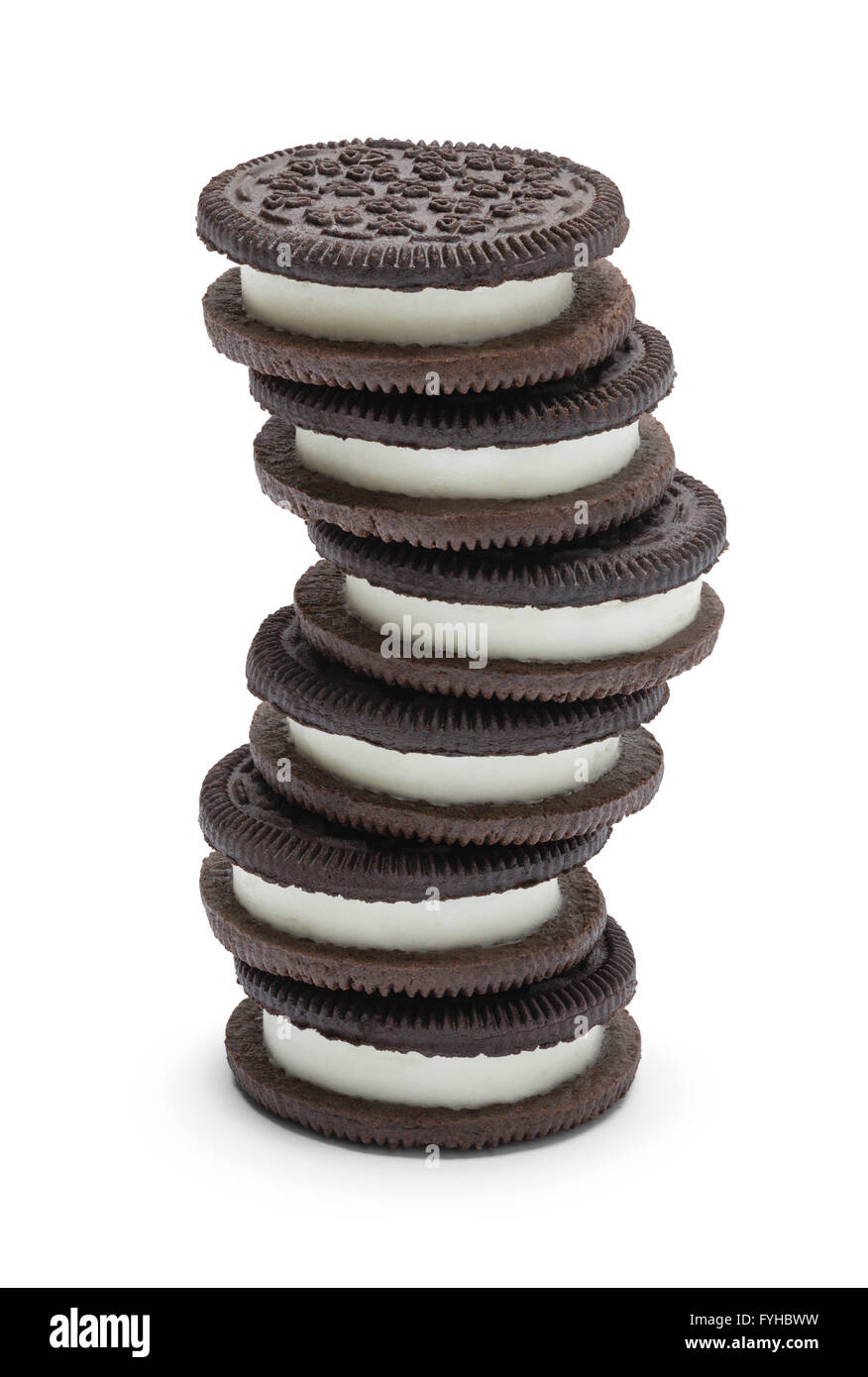 Stack of Chocolate Sandwich Cookies With Frosting Isolated on White Background. Stock Photo
