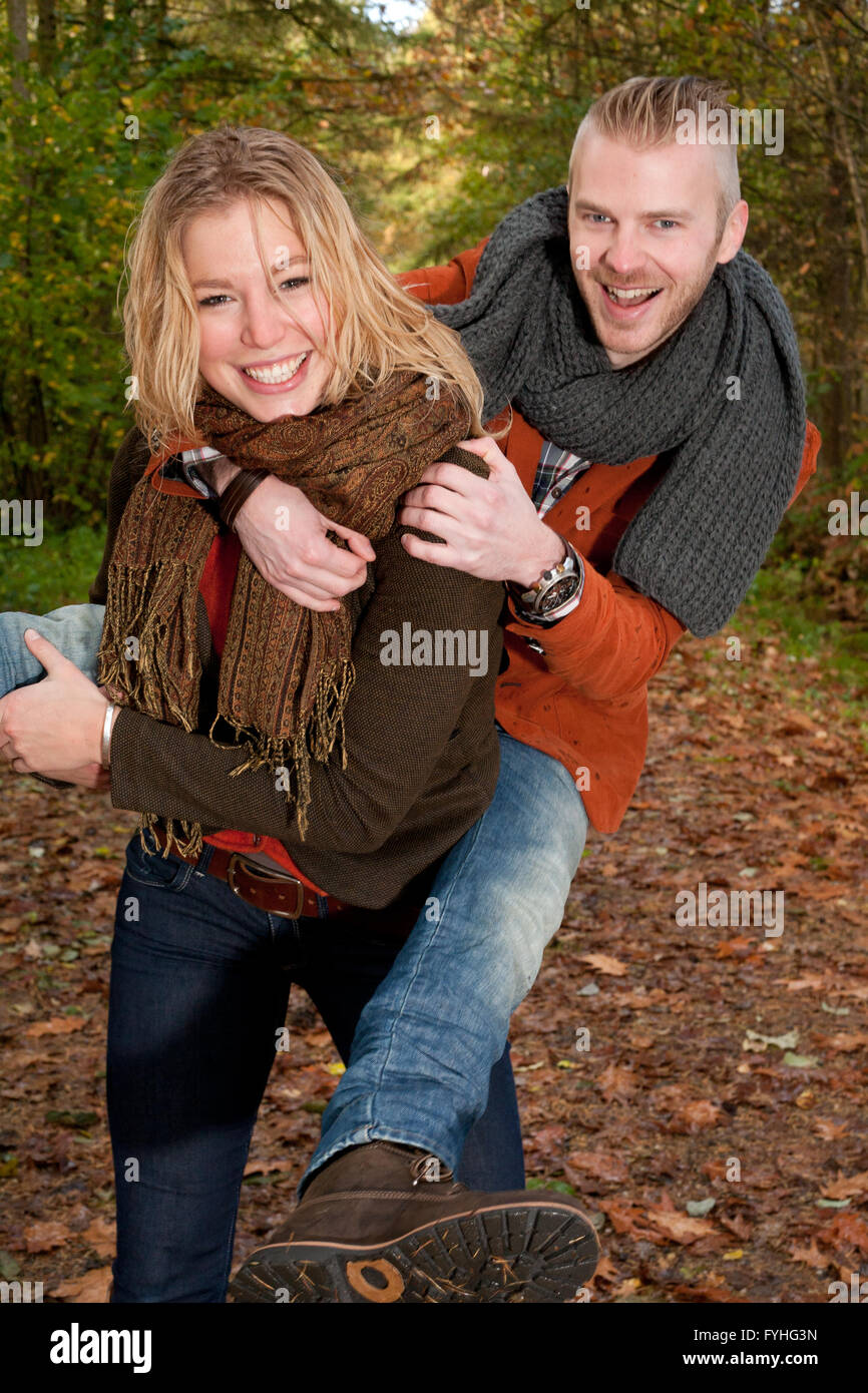 Couple is having fun while it's raining Stock Photo