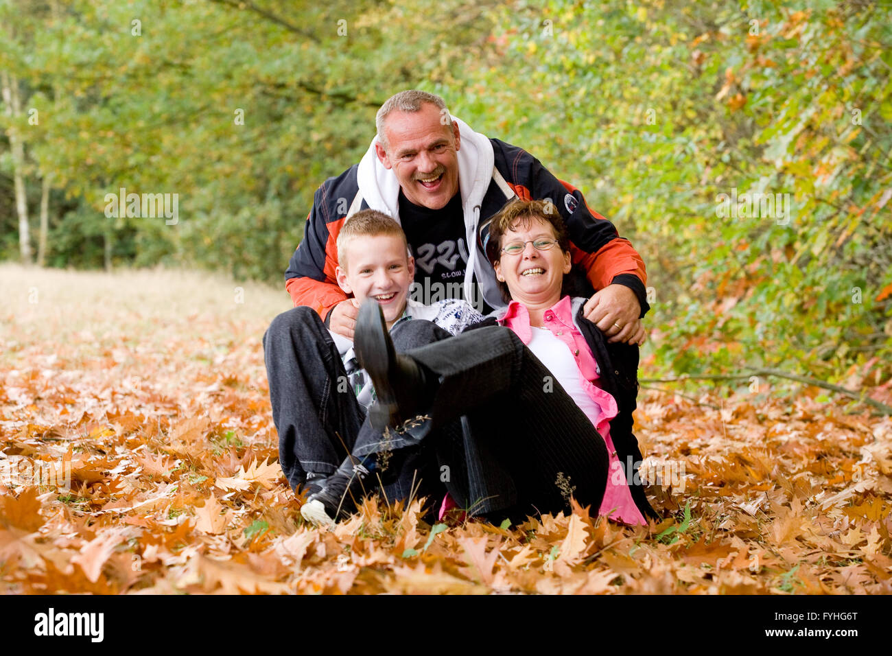 Happy family having fun Stock Photo - Alamy