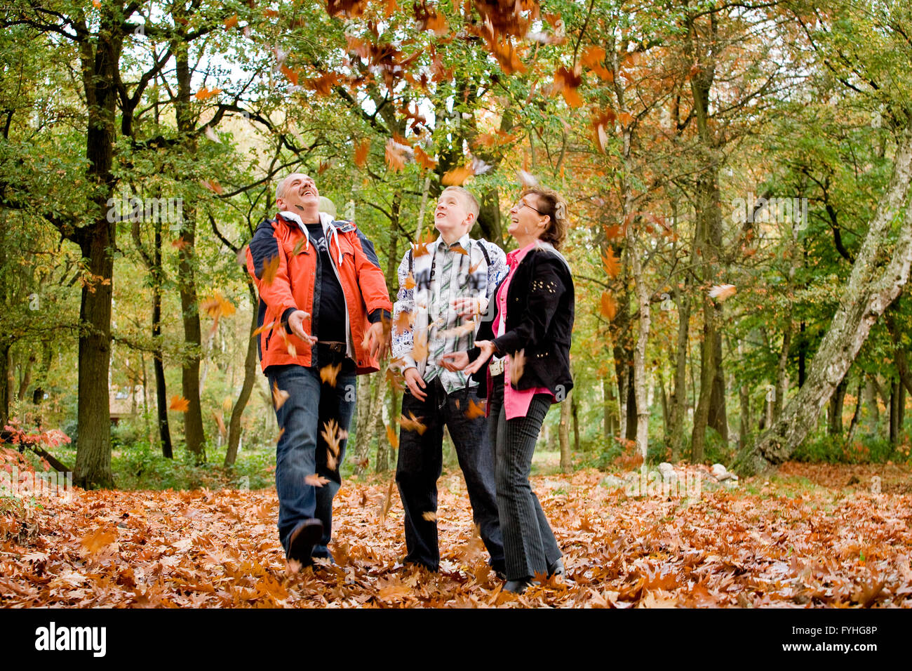 Happy family looking up Stock Photo Alamy