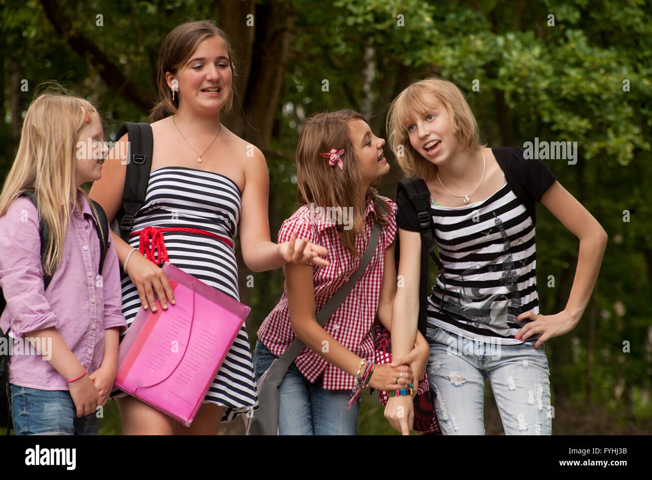 happy girl group in the park Stock Photo