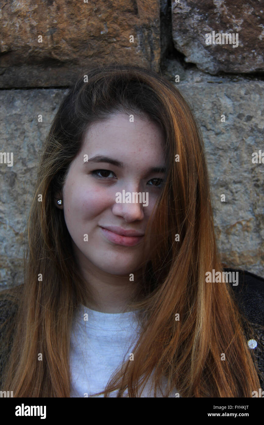 Latina Girl slightly smiling Stock Photo