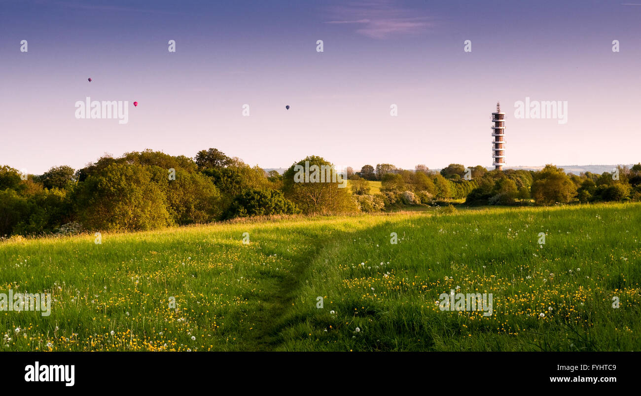 A traditional Bristolian scene of three hot air balloons floating over the city as seen from Purdown. Stock Photo