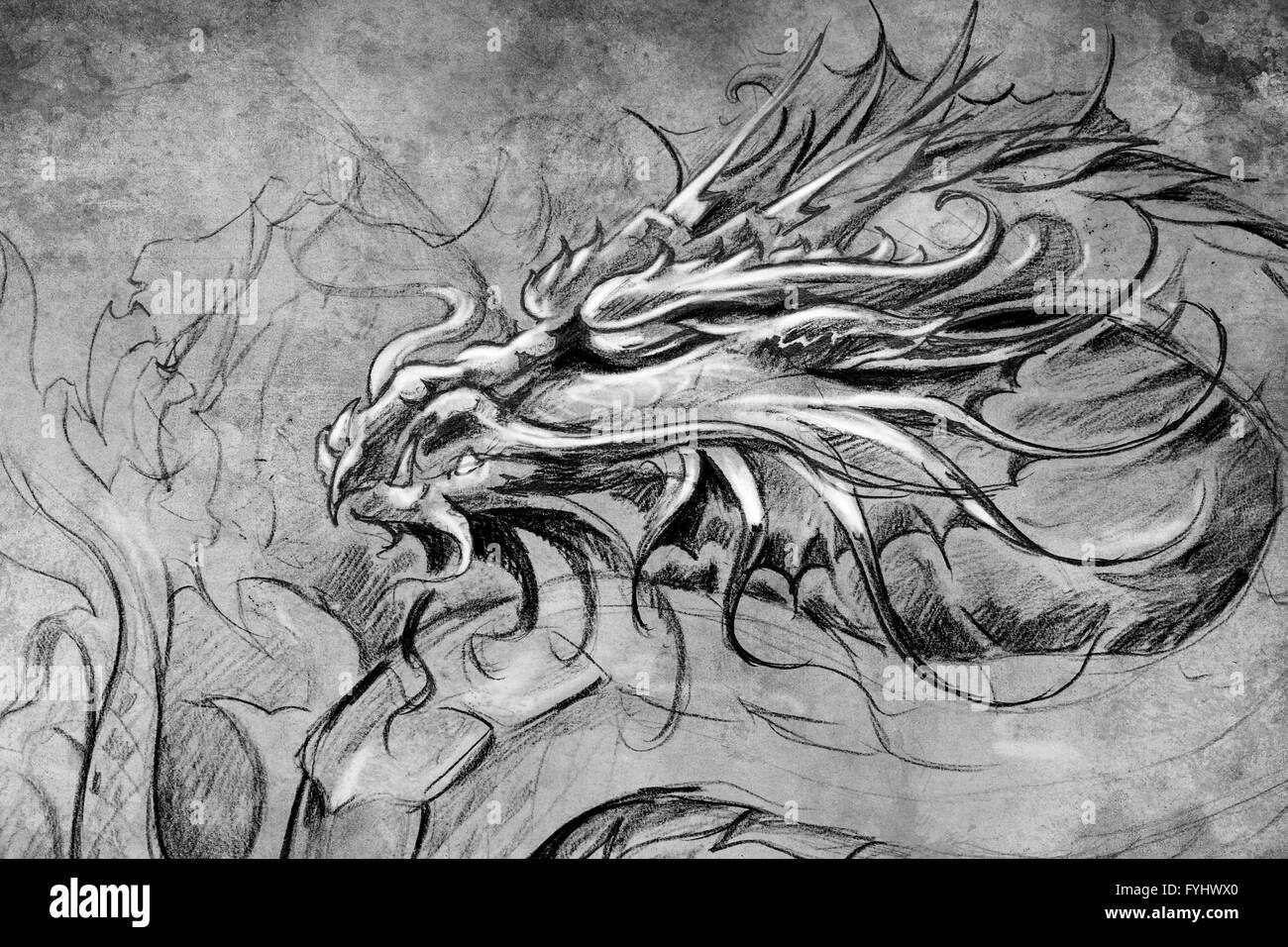 Medieval dragon head. Tattoo design over grey background. textured backdrop. Artistic image Stock Photo