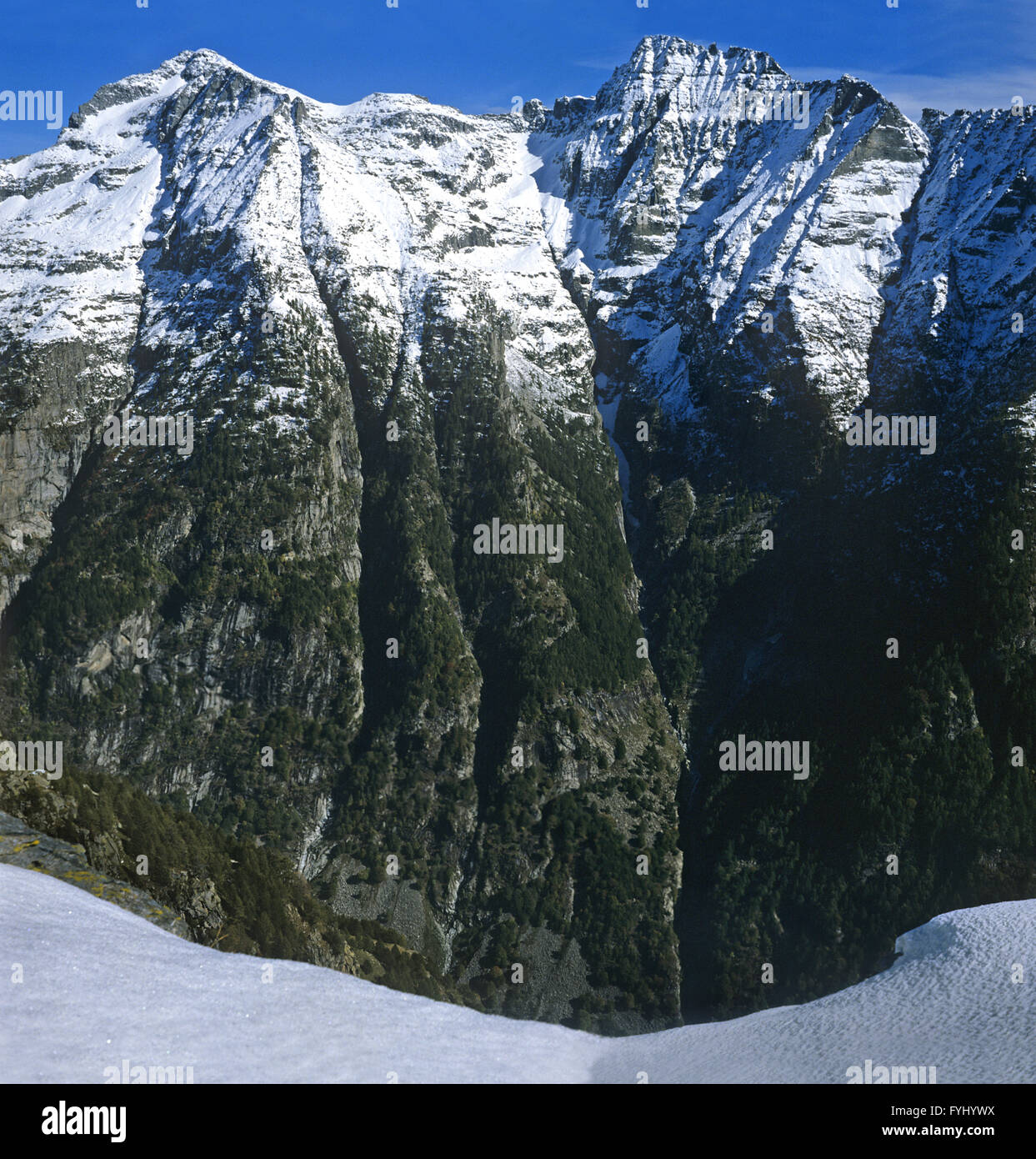 Mountain range with snowy peaks Stock Photo