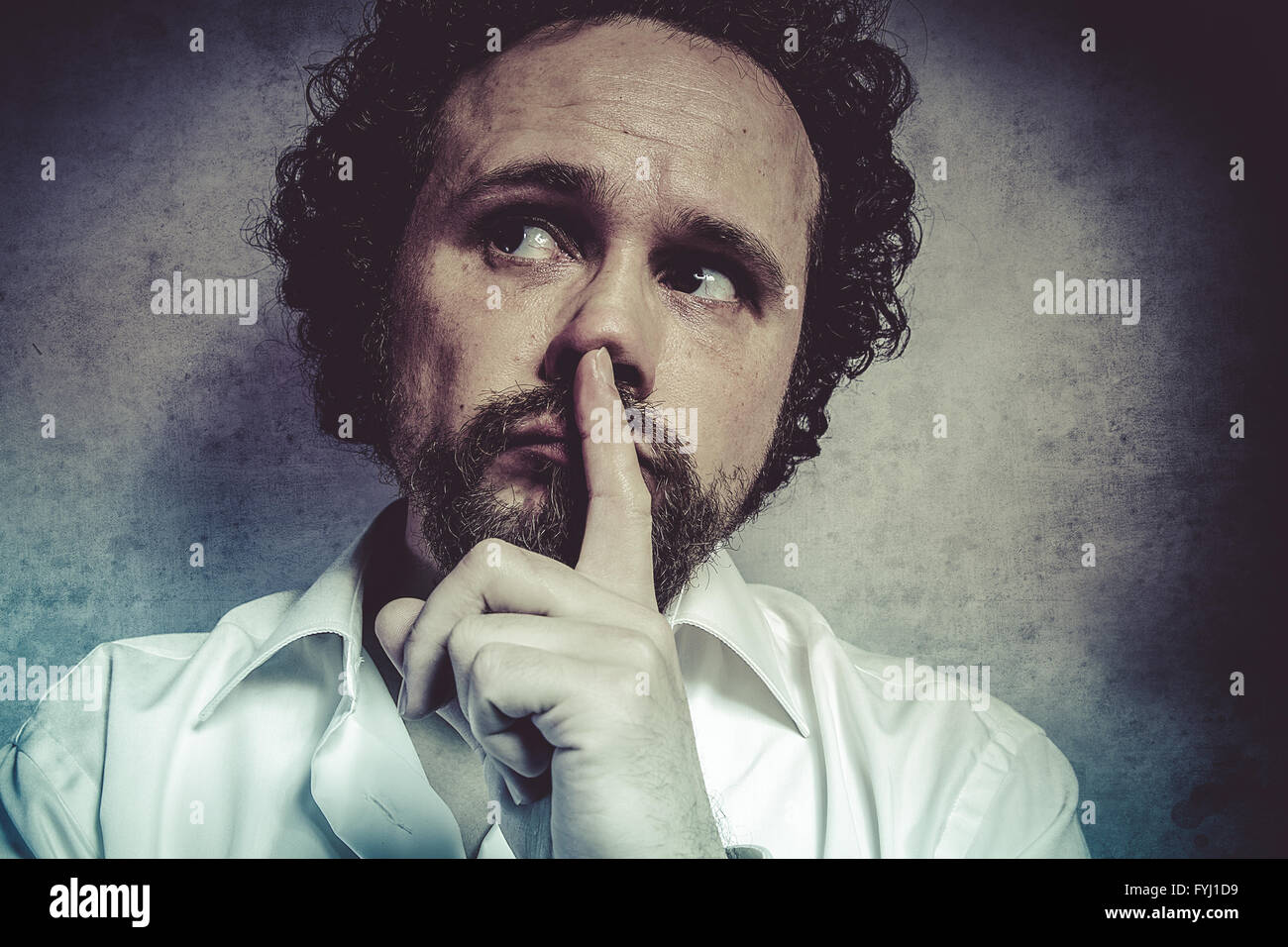 decisionmaking, man in white shirt with funny expressions Stock Photo