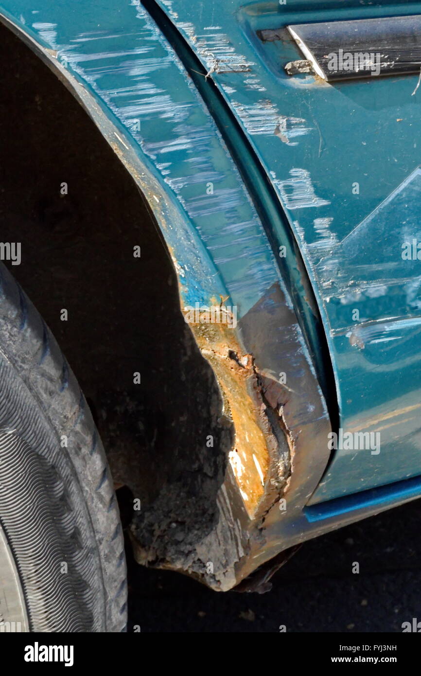Scratched metal sheet and rust paint on a car Stock Photo Alamy