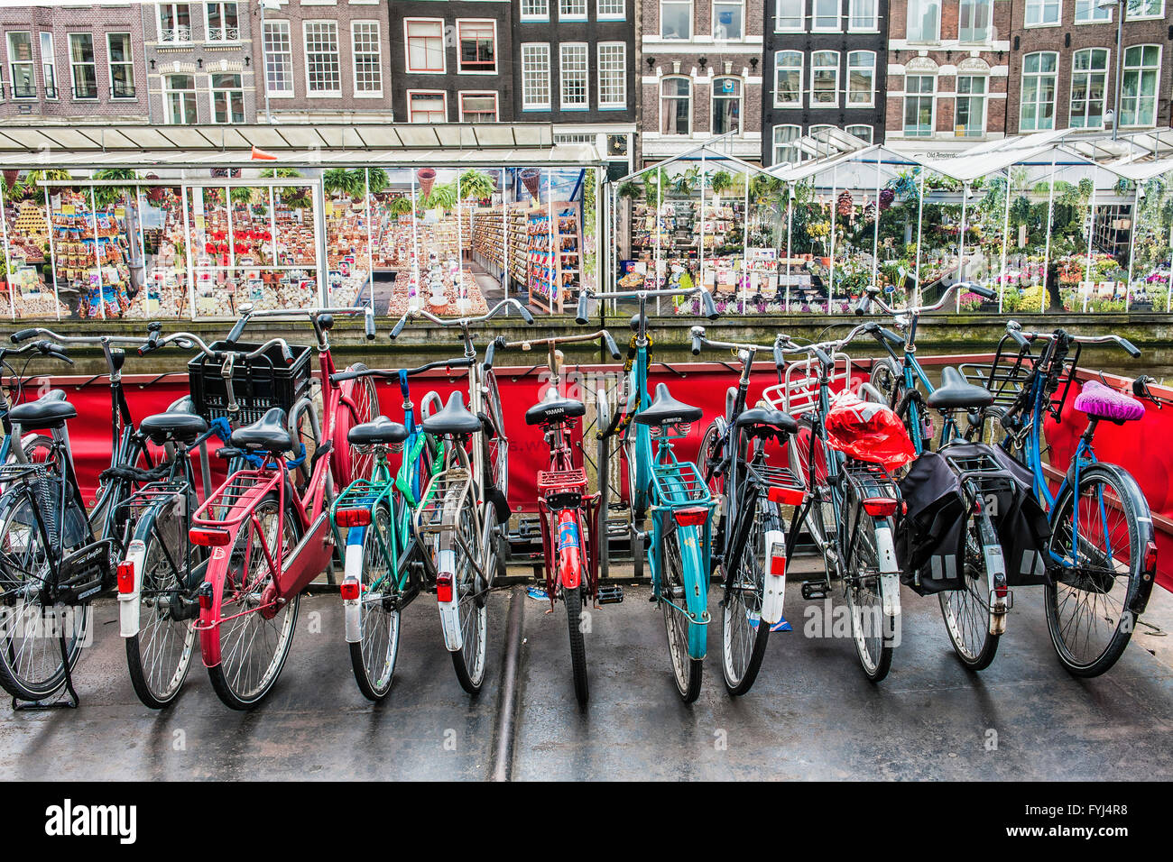 Amsterdam, Netherlands. Bicycles parked in a special parking in the city. The bicycle is the most used means of transportation. Stock Photo