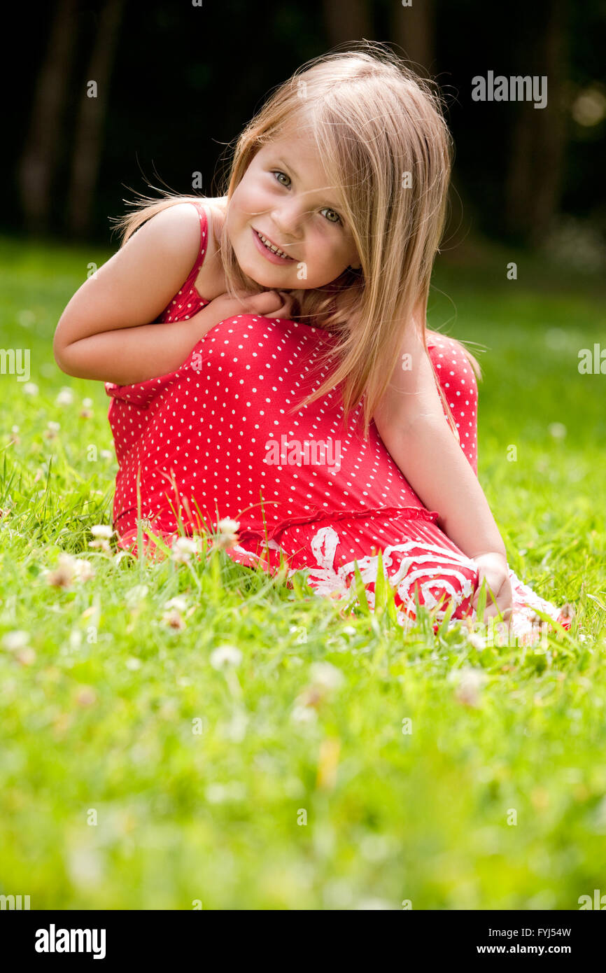 Sweet little red girl Stock Photo