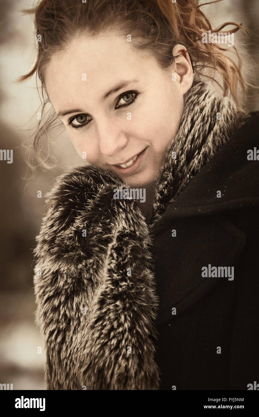 Brownish portrait of beauty in winter coat Stock Photo