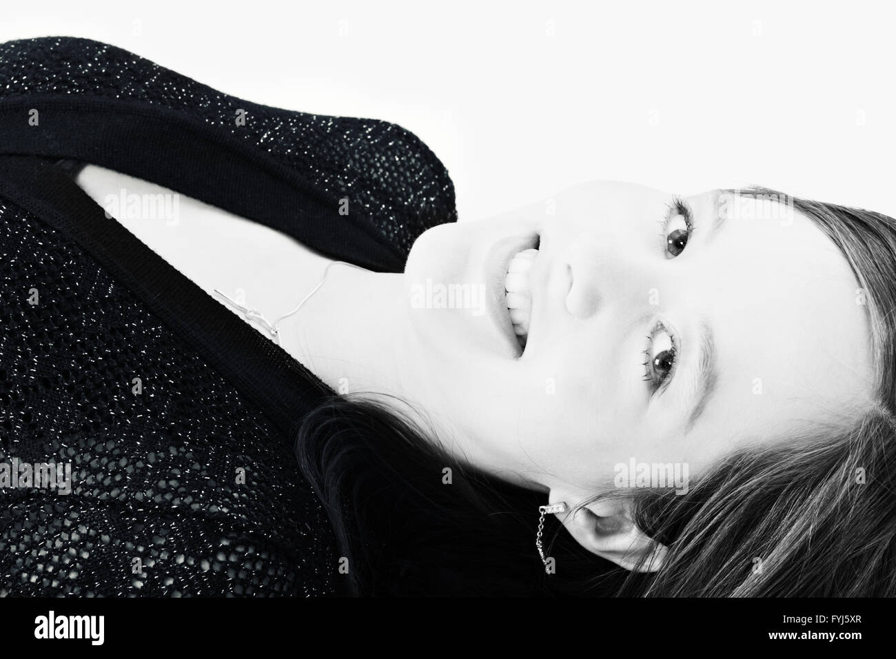 Beautiful model lying on the studio floor Stock Photo