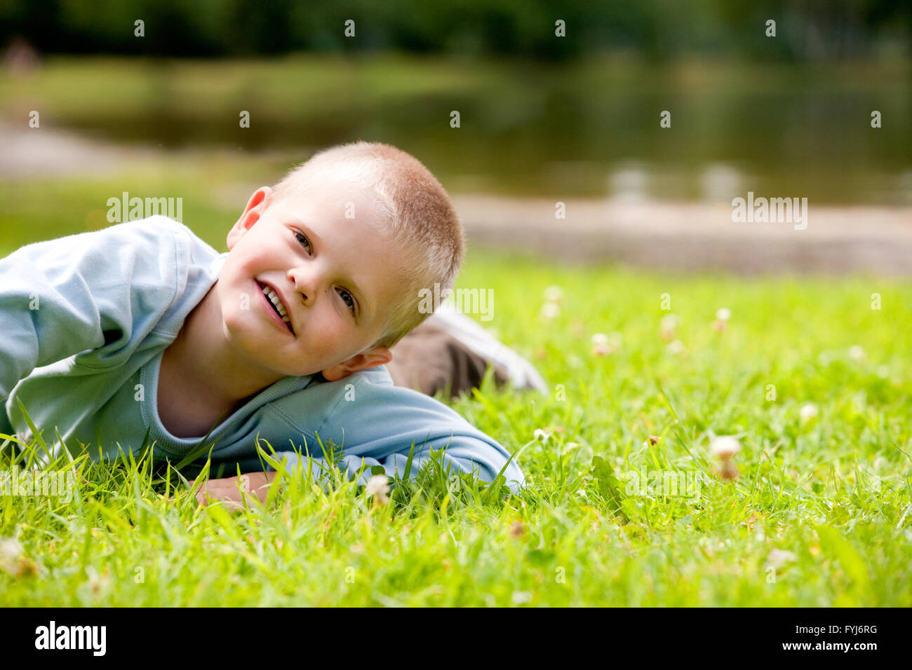 Big boy is rolling over the grass Stock Photo Alamy