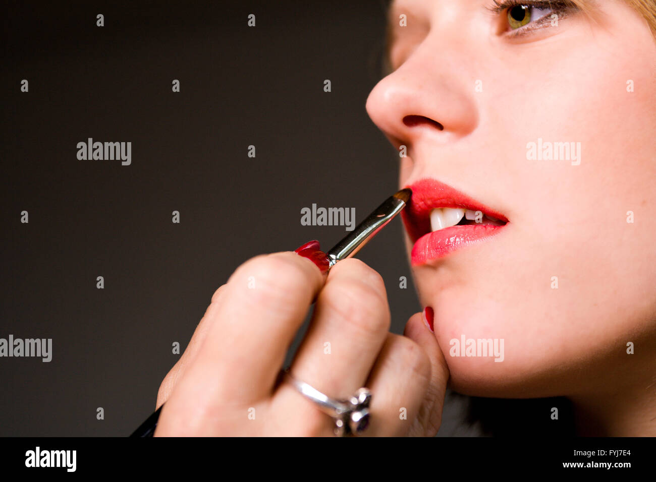 Making up my lips Stock Photo