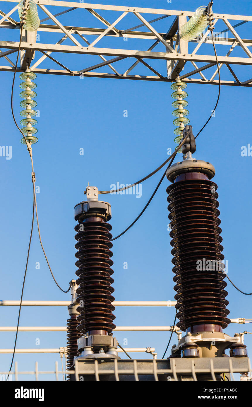 High-voltage insulators on transformer substation Stock Photo