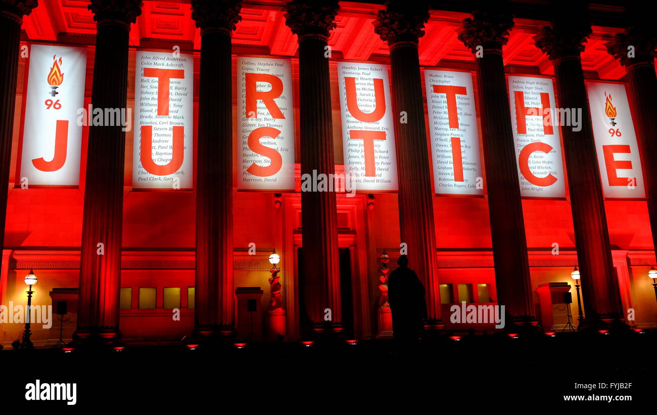 Liverpool's St Georges Hall illuminated in red with banners displaying the names of the 96 victims of the Hillsborough disaster. Stock Photo