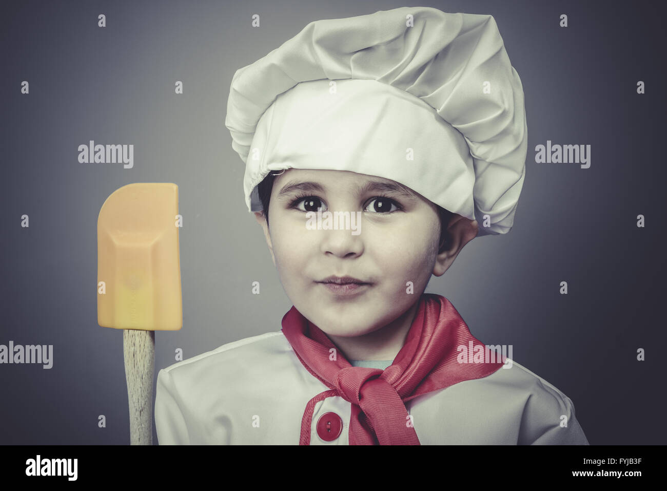 baker child dress funny chef, cooking utensils Stock Photo Alamy