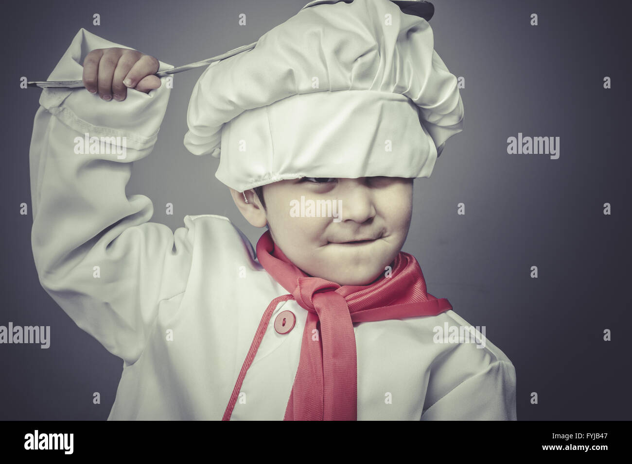 preparing, child dress funny chef, cooking utensils Stock Photo Alamy