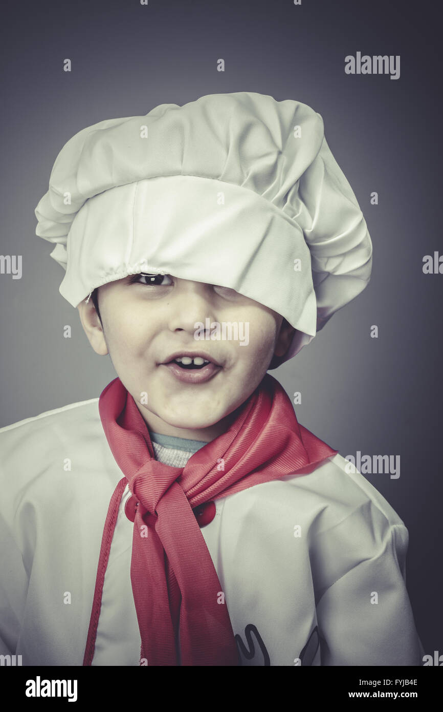 pastry child dress funny chef, cooking utensils Stock Photo Alamy