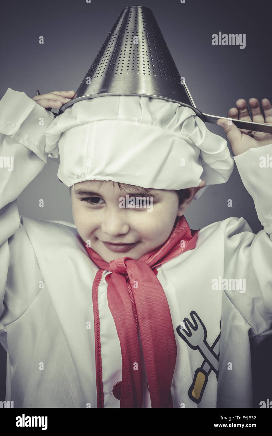 child dress funny chef, cooking utensils Stock Photo Alamy