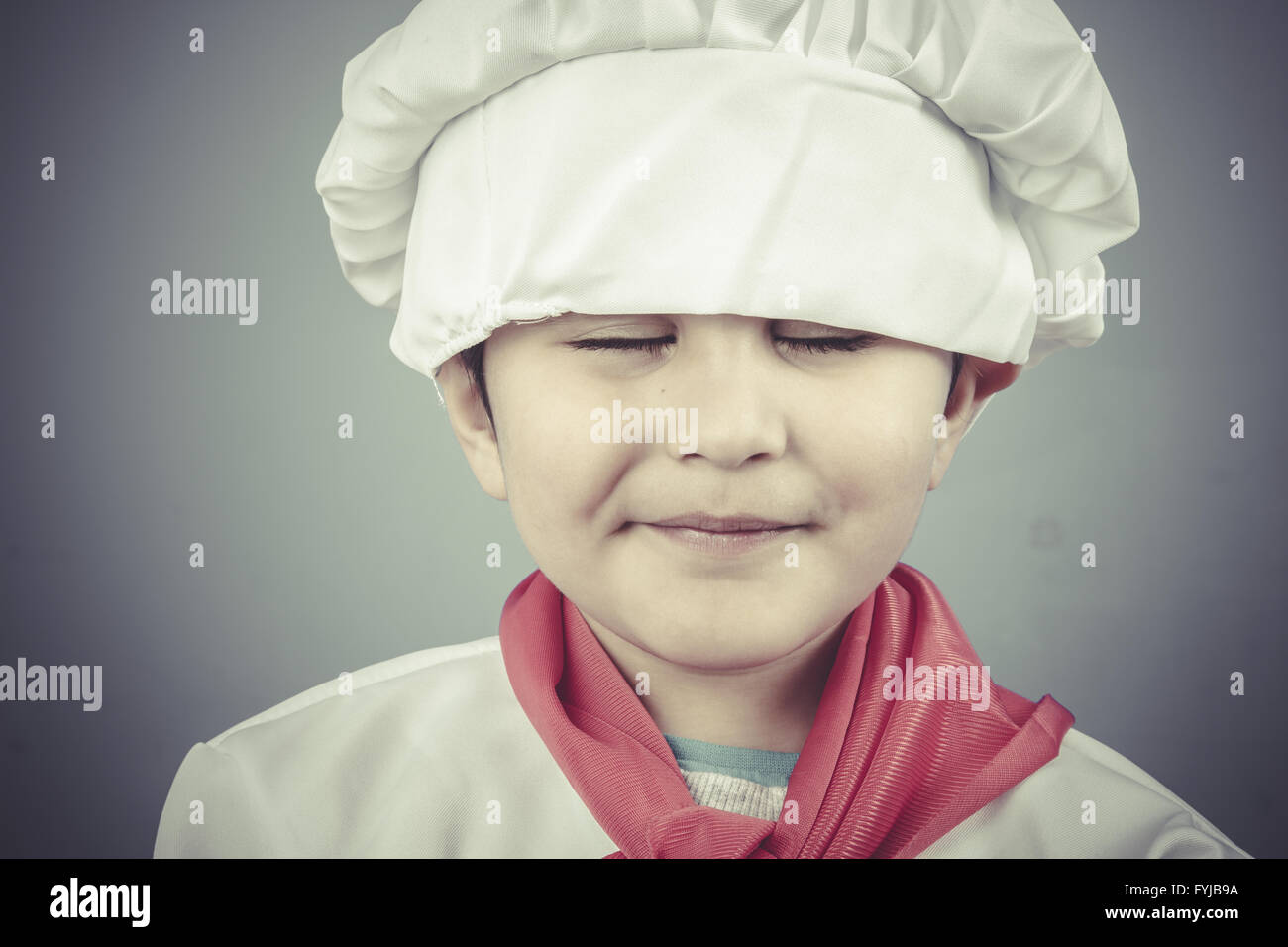 happy child dress funny chef, cooking utensils Stock Photo Alamy