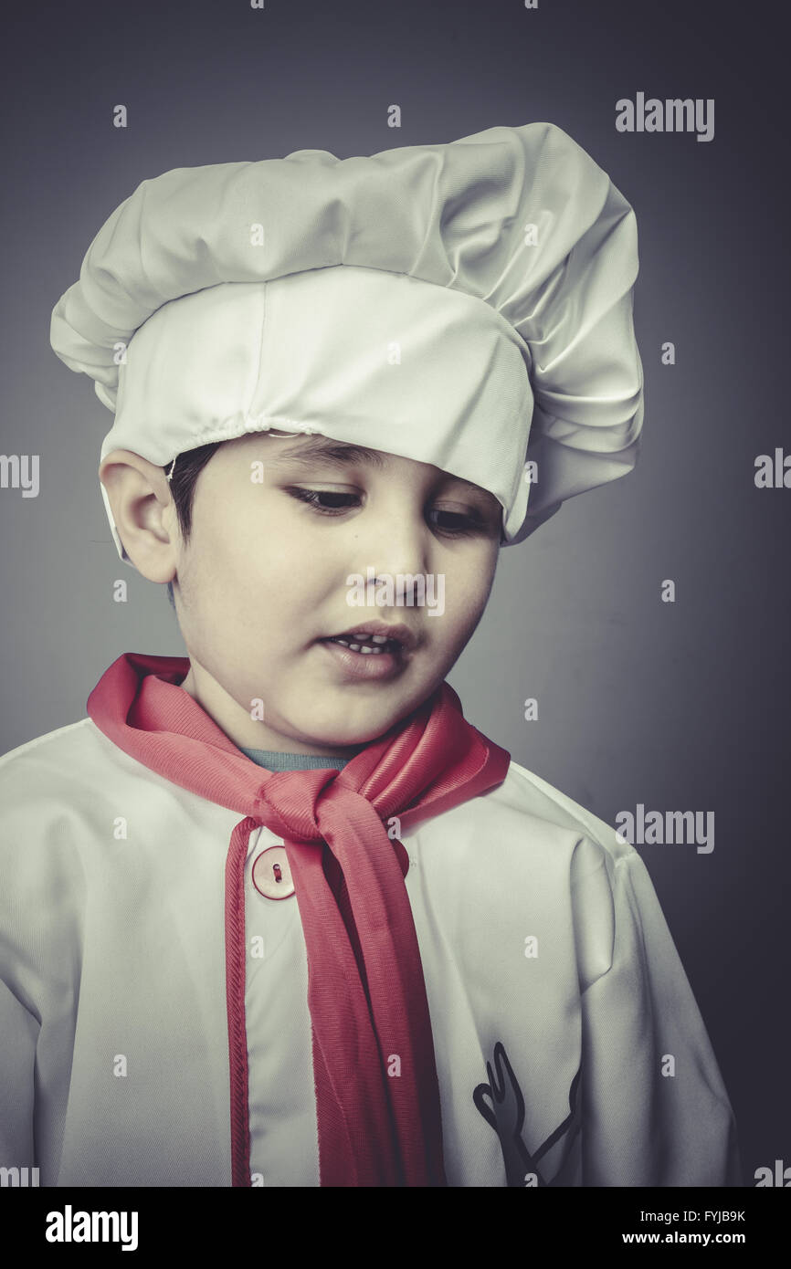 child dress funny chef, cooking utensils Stock Photo Alamy