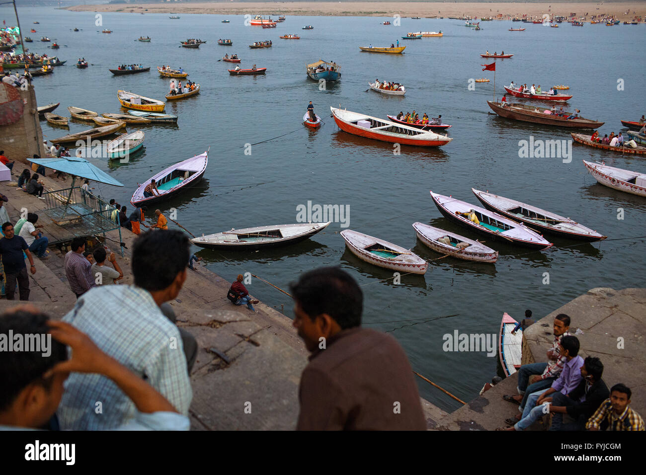 A view onto the Ganges river with boats from one of the ghats in Varanasi, India. Stock Photo