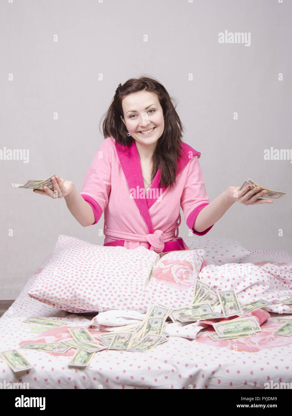Girl sitting on bed hires stock photography and images Alamy