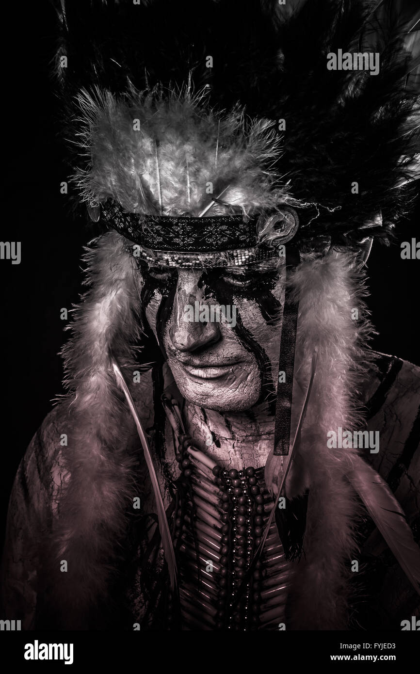 Native, American Indian chief with big feather headdress Stock Photo ...
